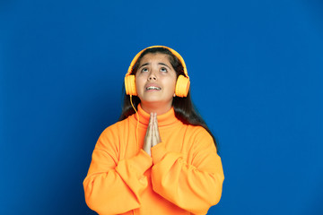 Preteen girl with yellow jersey