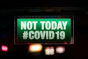 Not Today Covid-19 3D Illustration Text on Green Lighted Sign