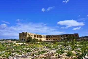Fototapeta na wymiar Old hospital in Comino island - the smallest sister of Malta