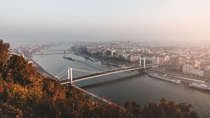 Amazing view of Danube river with famous bridges in autumn morning in Budapest, Hungary