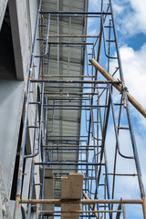 Close up detail of Steel scaffolding at construction site with protection.