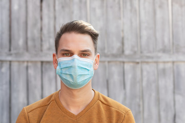Young man with surgical mask