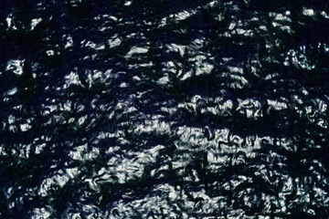 the glare of the sun on the surface of the water. the waves. flares