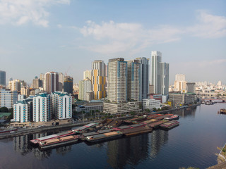Aerial shot of construction sites, condominiums, office blocks and high rises located near the Pasig river in Metro Manila, Philippines