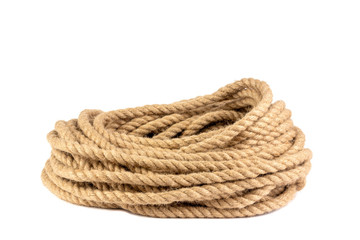 a coil of rope isolated on a white background close up - obrazy, fototapety, plakaty
