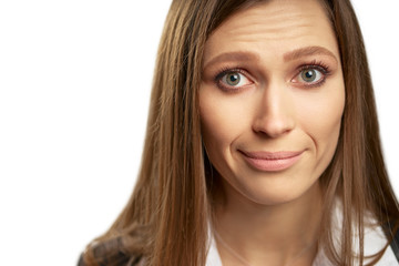 Fototapeta premium Confused, doubtful and sceptic young woman. Closeup studio portrait, isolated on white background.