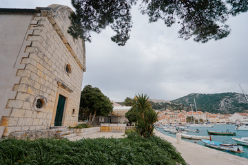 Naklejka premium Hvar Old Town Promenade. Sea coast in Dalmatia,Croatia. A famous tourist destination on the Adriatic sea.