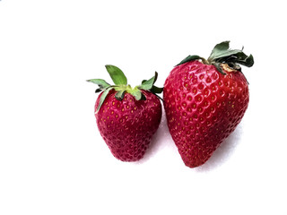 garden berries on a white background. perfect background for slides. an advertising option for farmers. the farm's products. red strawberries. strawberries in sugar