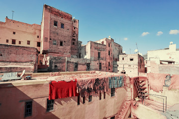 The ancient city. Old houses rooftops with drying leather in medina of Fes, Morocco.