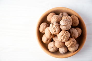 walnuts in a wooden bowl