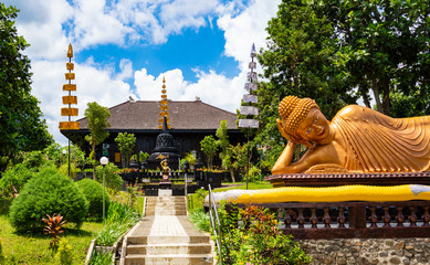 Batu, Indonesia - CIRCA Apr 2020: A sleeping Buddha statue in Dhammadipa Arama Temple, in Batu,...