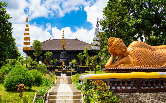 Batu, Indonesia - CIRCA Apr 2020: A sleeping Buddha statue in Dhammadipa Arama Temple, in Batu, East Java.