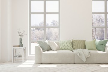 White living room with sofa and winter landscape in window. Scandinavian interior design. 3D illustration