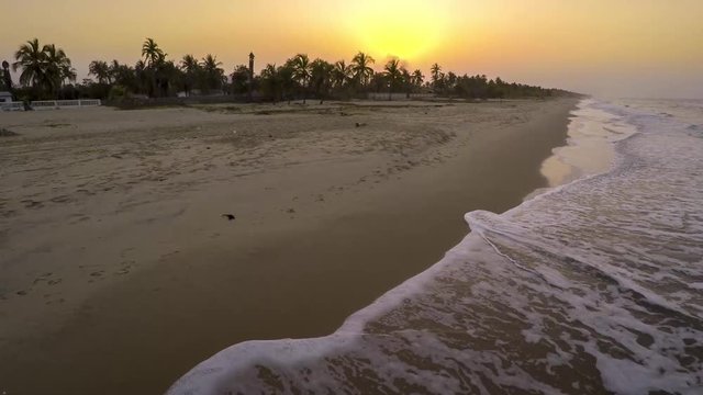 Drone clip of a golden hour sunset in a beach, of Venezuela