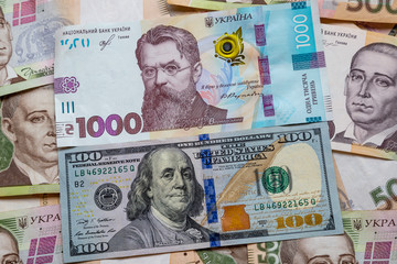 Banknotes of Ukraine and the United States. World crisis..