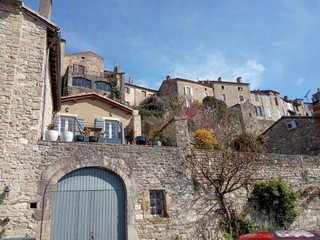 streets and walls of a medieval castle in the South of France in spring