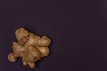 ginger root on a purple background, cooking, spice, organik