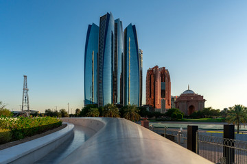 Fototapeta na wymiar Beautiful view of Abu Dhabi city iconic landmarks and skyscrapers | Al Etihad Jumeirah towers in the corniche road 