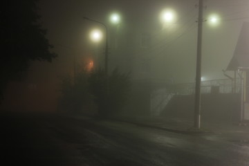 Fog in the city at night under the lights | EKATERINBURG, RUSSIA - 18 JULY 2013.