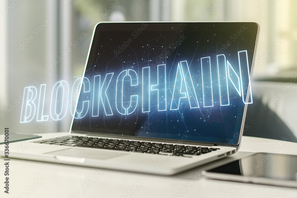 Poster double exposure of blockchain technology hologram on laptop background. research and development dec