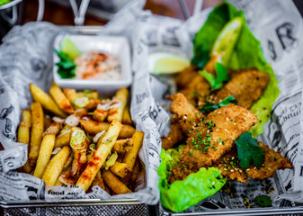 Fried chicken wings with french fries 