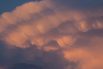 Close-up of fibrous-edged top part of cumulonimbus capillatus cloud
