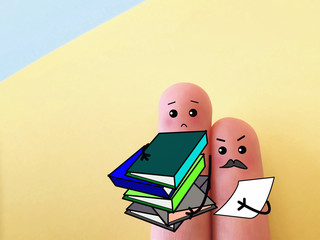 Two fingers are decorated as two person. They are feeling stressful at office.