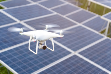 Drones flying over solar cells