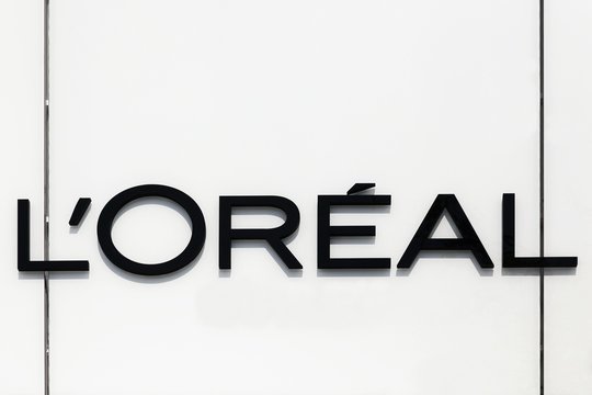 Villefontaine, France - May 24, 2018: L'Oreal logo on a wall. L'Oreal is a French personal care company and it is the world's largest cosmetics company