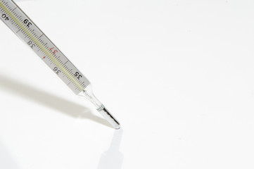 mercury thermometer on a white background. Concept - Coronovirus Disease