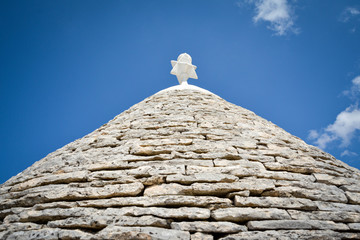 Fototapeta na wymiar view of the typical conic roof of a trullo building. Alberobello, Puglia. Italy