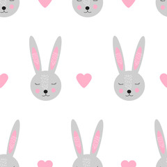 Seamless pattern with cute bunny face and hearts.
