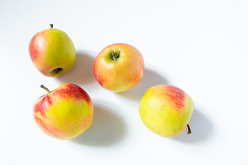 Composition with fruits: apples isolated on white background
