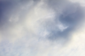 Clouds on a blue sky as a background