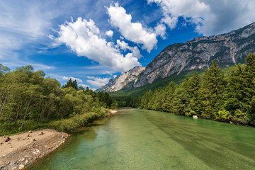 Fototapeta na wymiar The green Gail River and Alps, the largest tributary of the Drava River. Carinthia, Austria, Europa
