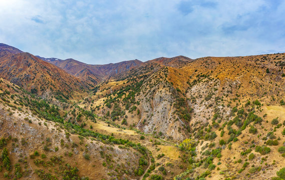 Panorama of the Sairam su gorge in southern Kazakhstan. Sairam Ugam nature Park. Texture background of the foothills of mountains Sairamsu in Central Asia