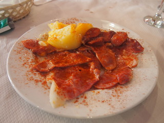 Cooking with bacon at the restaurant in Santiago de Compostela, Camino de Santiago, Way of St. James, Portuguese way, Spain