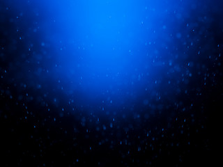 Fototapeta na wymiar Blue bokeh on a dark background. Blur the background and wallpaper