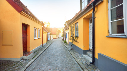 An empty street with old traditional houses. People are staying home because of coronavirus...
