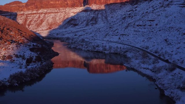Aerial Footage Flyover of Colorado River & Reflections in Winter Near Moab, Utah U.S.A. by Drone