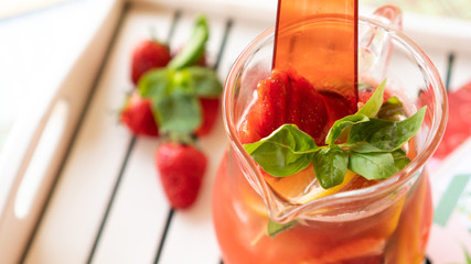 jug of strawberry lemonade close up 
