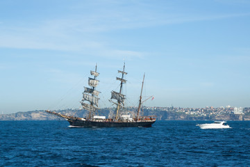 Fototapeta na wymiar Sydney Australia, view of old schooner and speed boat off coast