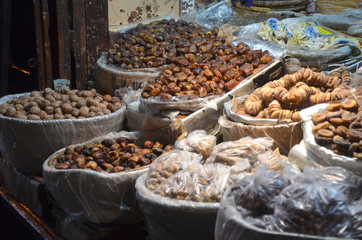 Fes market that selling local produce. Moroccan cooking is enhanced with fruits, dried and fresh — apricots, dates, figs, and raisins, to name a few.
