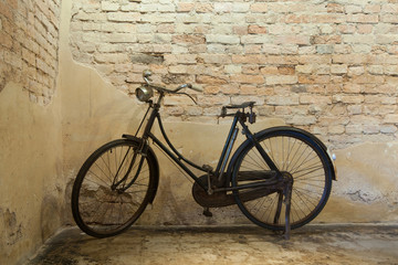 
Old bicycle and antique building