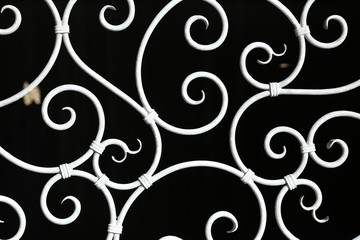 Metal fence. Metal curly fence in the park