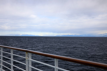Fototapeta premium Seward, Alaska / USA - August 08, 2019: View from ship cruise deck, Seward, Alaska, USA