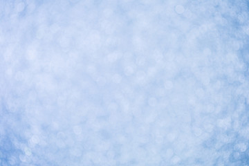 Decorative christmas background with bokeh lights and snowflakes 