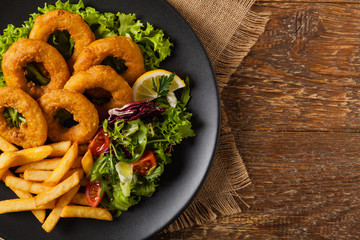Roasted squid rings with fries