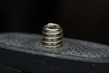 close-up photo of a screw used in phoography industry