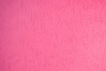 Close-up abstract pink stucco wall background